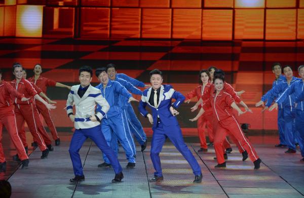 《小蘋果》、《最炫民族風(fēng)》等廣場舞曲將會有全國統(tǒng)一、編排科學(xué)、帶給人正能量的全新動作。 CFP 資料